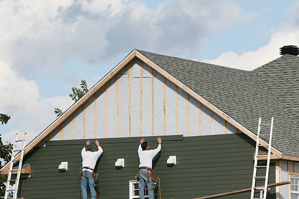 Professional Emergency Siding Repair technician working in Hartville, OH